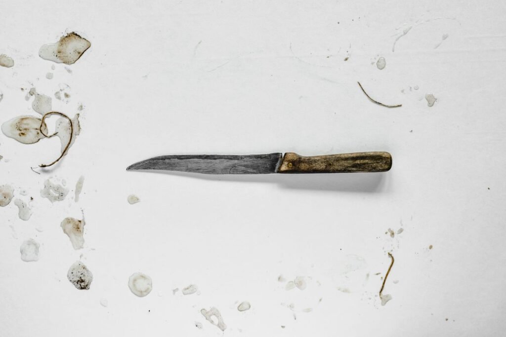 A worn kitchen knife with a wooden handle, how to dispose of kitchen knives safely