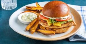 making fried chicken burger