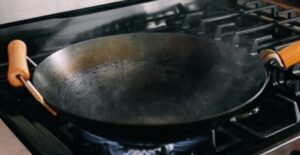how to keep a wok from sticking