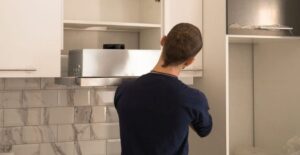 how to install a range hood under cabinet