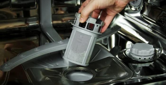how to fix standing water in the dishwasher
