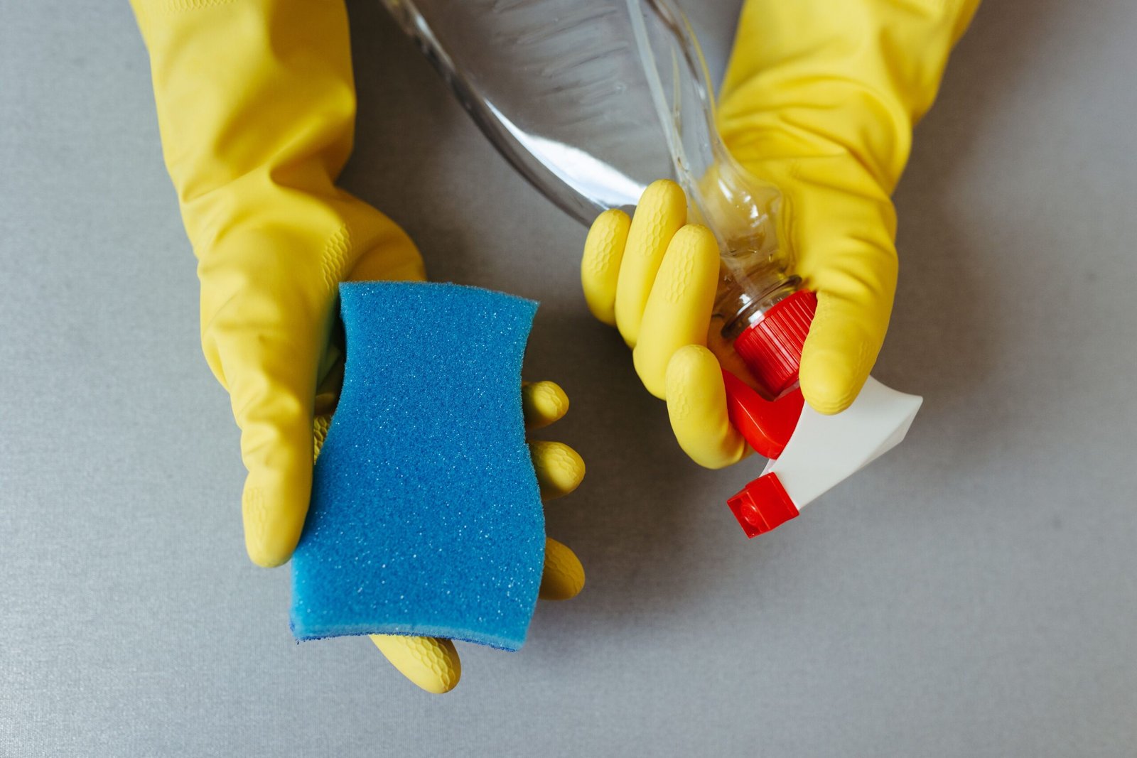 Cleaning gloves and supplies used to safely clean a water softener resin tank