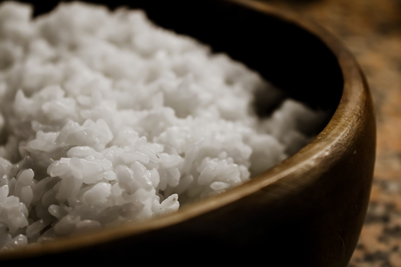 rice kept warm in a rice cooker before serving