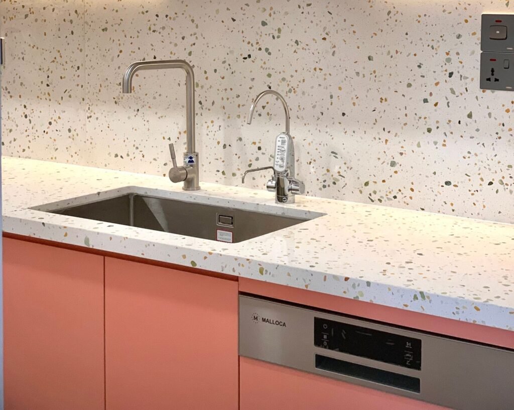 sleek stainless steel undermount sink set into a countertop