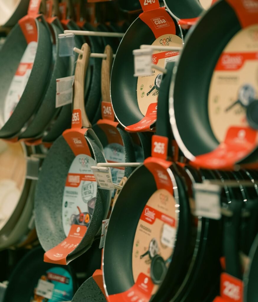 Nonstick frying pans for sale on a store shelf