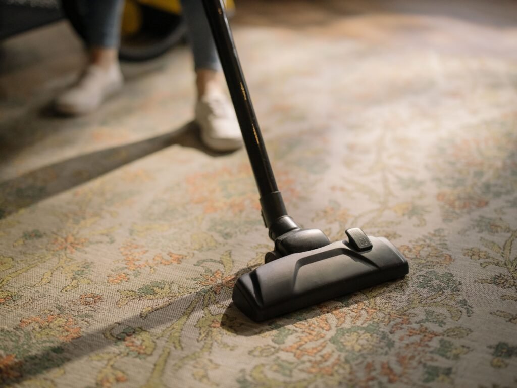 vacuuming carpet thoroughly before sanitizing