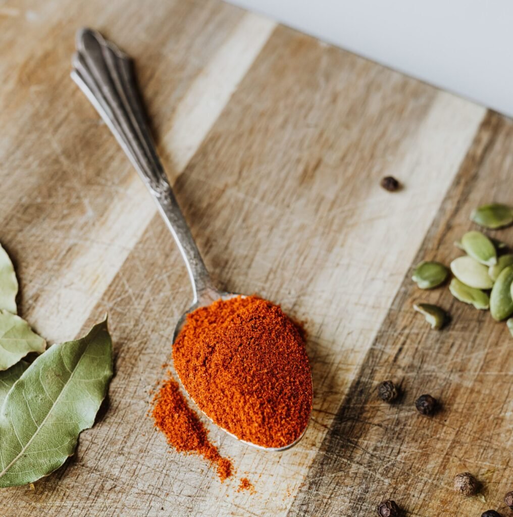 paprika and spices for seasoning wavy potato slices