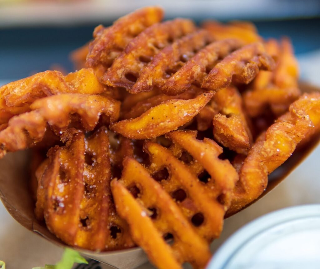 crispy golden waffle fries served with dipping sauce