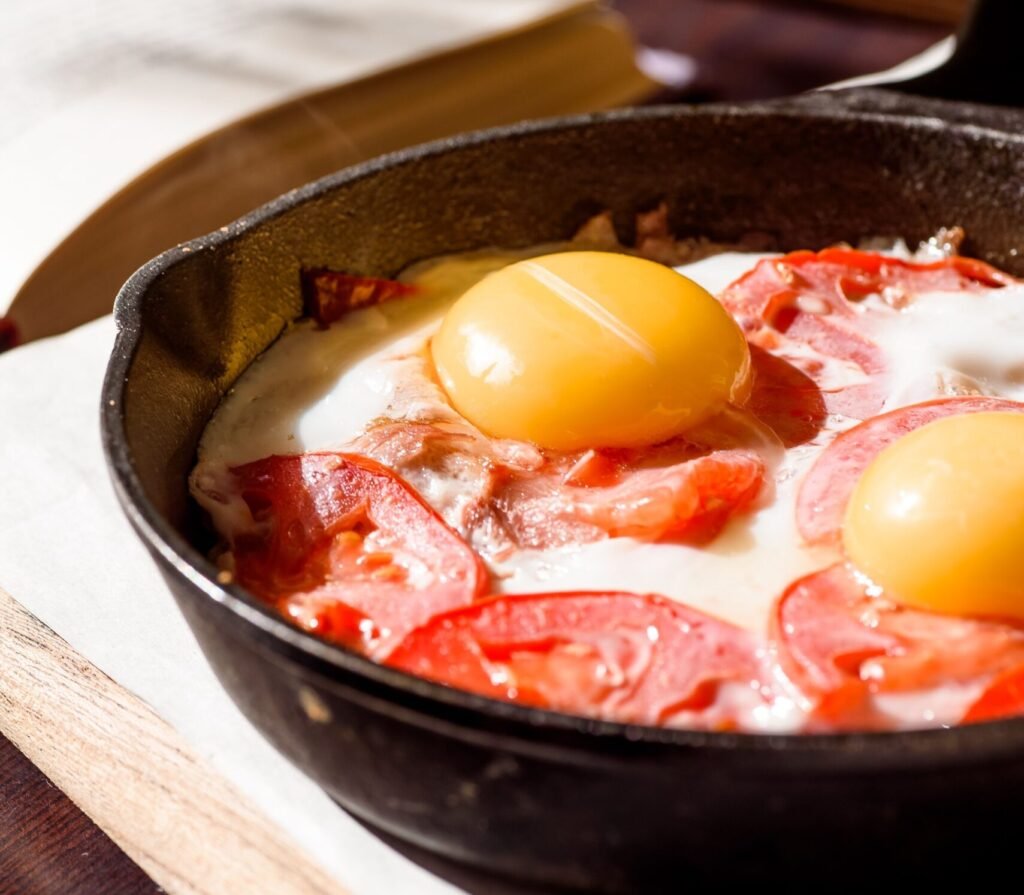 sunny side up eggs cooking in a cast iron skillet sunny side up eggs cooking in a cast iron skillet without sticking