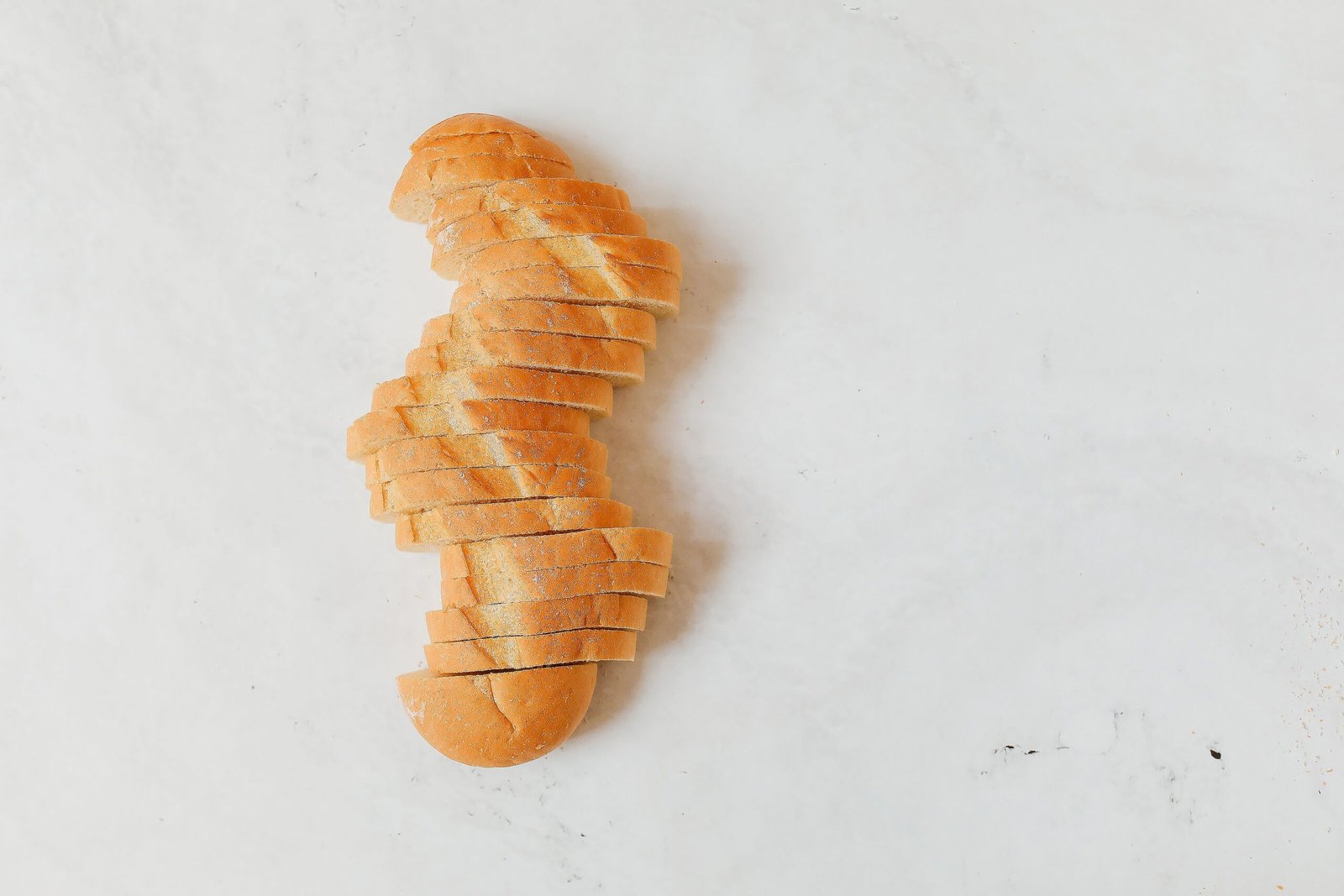 Sliced bread loaf on a kitchen counter
