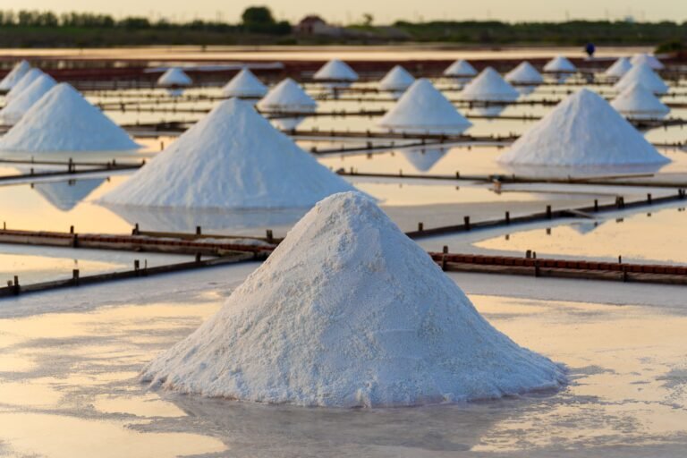 salt piles on traditional evaporation flats where crystals form as water evaporates