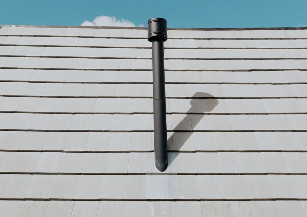vertical vent pipe exiting through a roof, the preferred venting method for a pellet stove