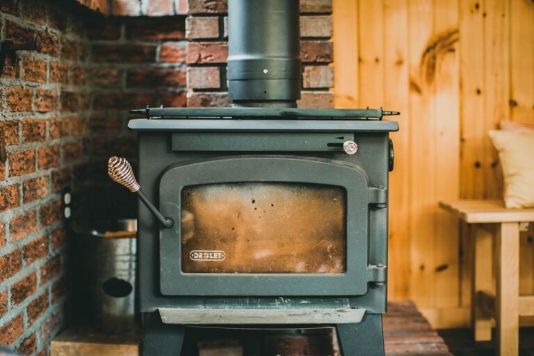 stove interior with an active fire, illustrating the steady, controlled burn a well-maintained pellet stove produces